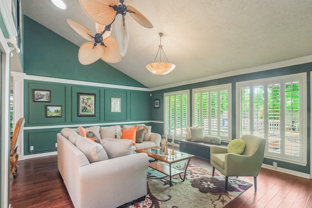 10022 Jan Glen Ln, Houston, TX 77070 - living room with wood-type flooring, a textured ceiling, lofted ceiling, ceiling fan, and ornamental molding