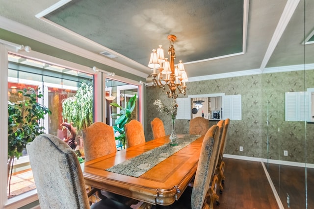 10022 Jan Glen Ln, Houston, TX 77070 - dining room with a chandelier, wood-type flooring, baseboards, ornamental molding, and wallpapered walls