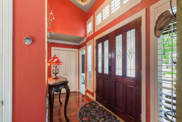 10022 Jan Glen Ln, Houston, TX 77070 - entryway featuring a textured wall and ornamental molding
