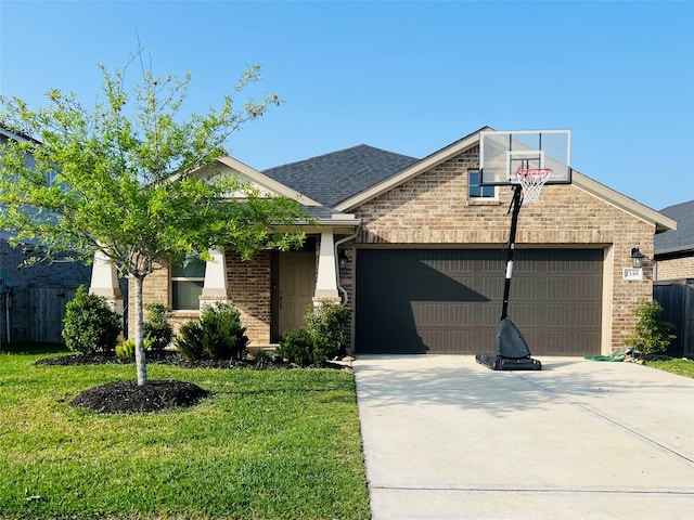 2338 Vanessa Cay Ln, La Porte, TX 77571 - view of front of house featuring driveway, a garage, brick siding, and a shingled roof