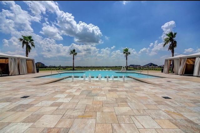 2338 Vanessa Cay Ln, La Porte, TX 77571 - community pool with a patio