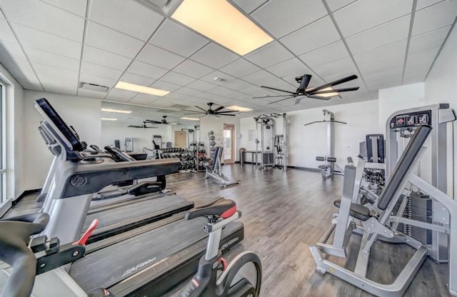 2338 Vanessa Cay Ln, La Porte, TX 77571 - exercise room with wood finished floors, ceiling fan, and a paneled ceiling