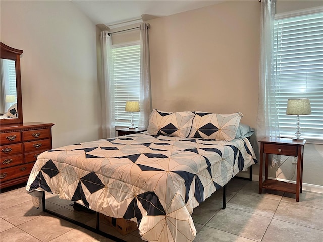 2338 Vanessa Cay Ln, La Porte, TX 77571 - bedroom featuring light tile patterned floors and baseboards