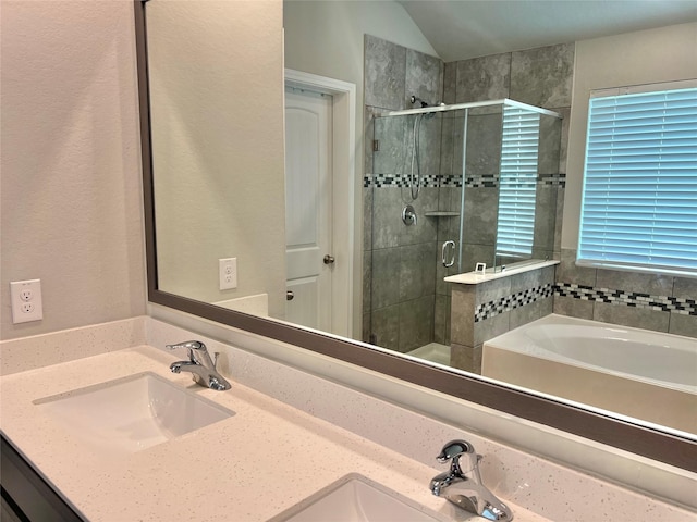 2338 Vanessa Cay Ln, La Porte, TX 77571 - bathroom with a shower stall, double vanity, a bath, and vaulted ceiling