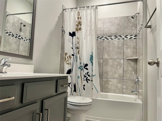 2338 Vanessa Cay Ln, La Porte, TX 77571 - full bathroom featuring shower / bath combo with shower curtain, vanity, toilet, and a textured wall