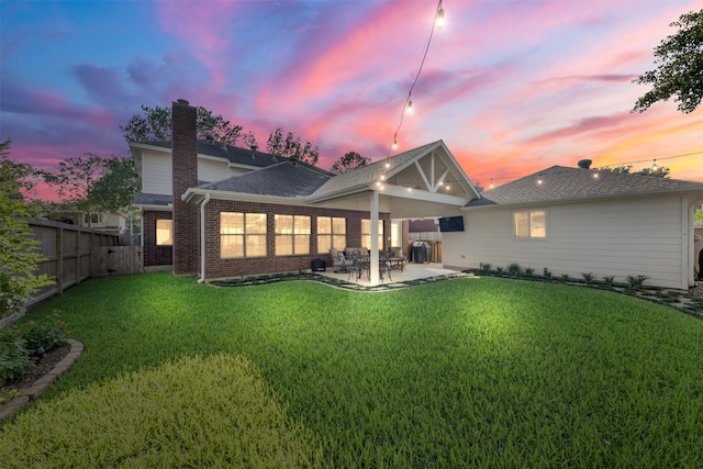 17326 Meadow Heights Dr, Houston, TX 77095 - back of property featuring a patio area, brick siding, a chimney, and roof with shingles