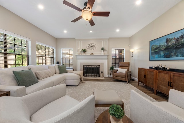 17326 Meadow Heights Dr, Houston, TX 77095 - living room featuring wood finished floors, recessed lighting, a tile fireplace, ceiling fan, and baseboards