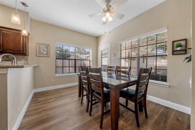 17326 Meadow Heights Dr, Houston, TX 77095 - dining area featuring dark wood finished floors, baseboards, and a ceiling fan
