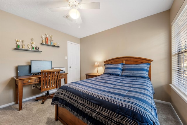 17326 Meadow Heights Dr, Houston, TX 77095 - carpeted bedroom with multiple windows, baseboards, and ceiling fan