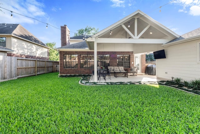 17326 Meadow Heights Dr, Houston, TX 77095 - back of house featuring brick siding, a patio area, a chimney, an outdoor living space, and roof with shingles