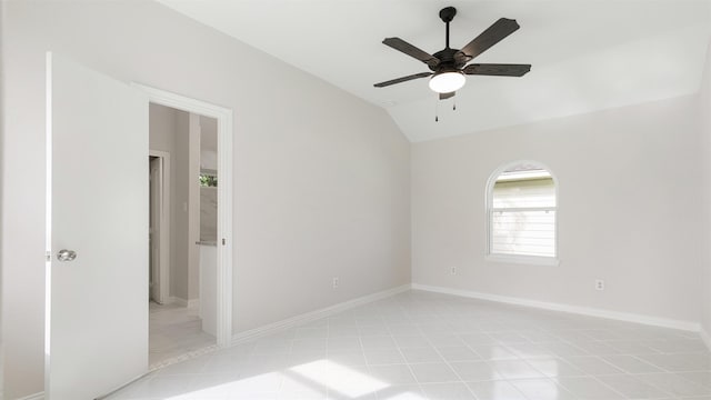 4007 Green Crest Dr, Houston, TX 77082 - unfurnished bedroom featuring lofted ceiling, light tile patterned floors, baseboards, and a ceiling fan