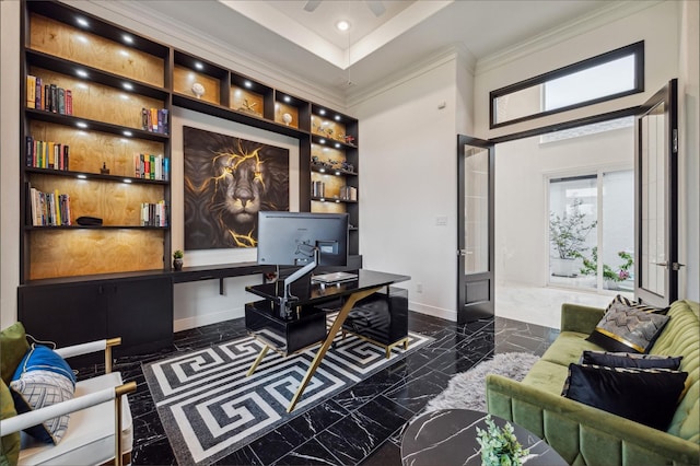 office space with dark marble finish floors, crown molding, baseboards, a towering ceiling, and built in shelves