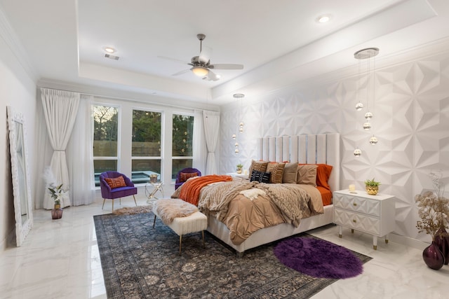 bedroom featuring a tray ceiling, crown molding, marble finish flooring, and ceiling fan
