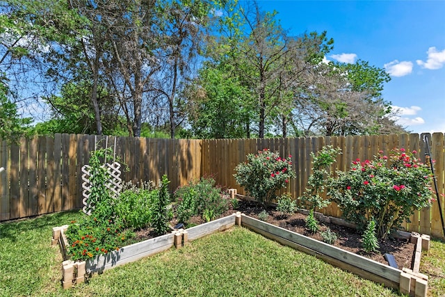 2117 Heritage Meadow Ln, Bryan, TX 77803 - view of yard with a garden