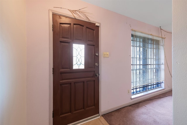6046 Harbrook Dr, Houston, TX 77087 - entrance foyer featuring light carpet and baseboards