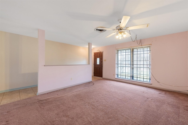 6046 Harbrook Dr, Houston, TX 77087 - carpeted spare room with ceiling fan and baseboards
