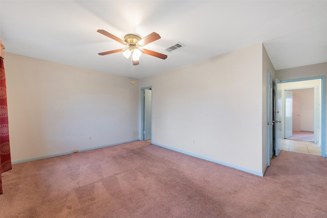 6046 Harbrook Dr, Houston, TX 77087 - spare room with light colored carpet, ceiling fan, and baseboards