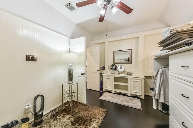 interior space featuring a ceiling fan and dark wood-style floors