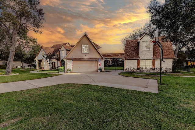 2714 W Trail Ct, Richmond, TX 77406 - view of front of house with stone siding, a yard, concrete driveway, and an attached garage