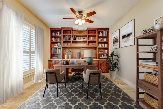 2714 W Trail Ct, Richmond, TX 77406 - office space with ceiling fan, baseboards, and stone tile floors