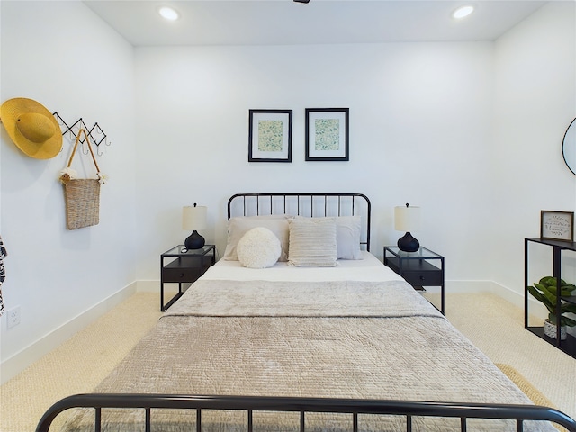 5808 Highland Sky Ln, Houston, TX 77091 - bedroom with light carpet, recessed lighting, and baseboards