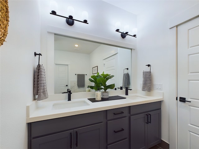 5808 Highland Sky Ln, Houston, TX 77091 - bathroom featuring double vanity and recessed lighting