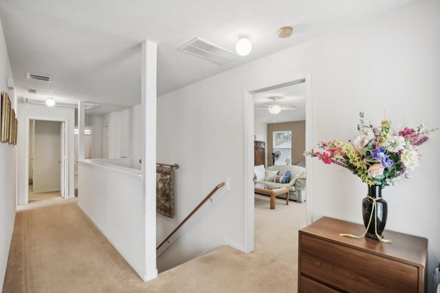 723 Slate Valley Ln, Spring, TX 77373 - hallway featuring an upstairs landing and light carpet
