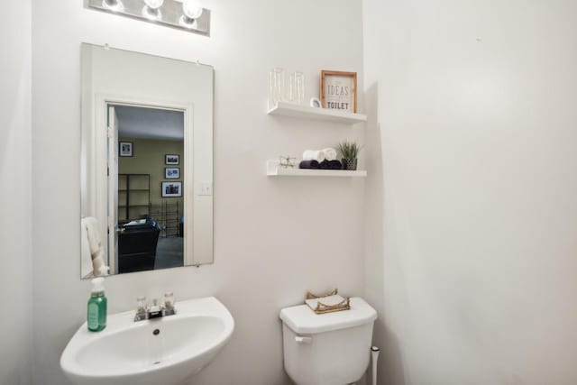 723 Slate Valley Ln, Spring, TX 77373 - bathroom featuring a sink and toilet