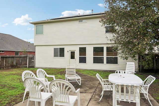 723 Slate Valley Ln, Spring, TX 77373 - rear view of property featuring a patio and outdoor dining space
