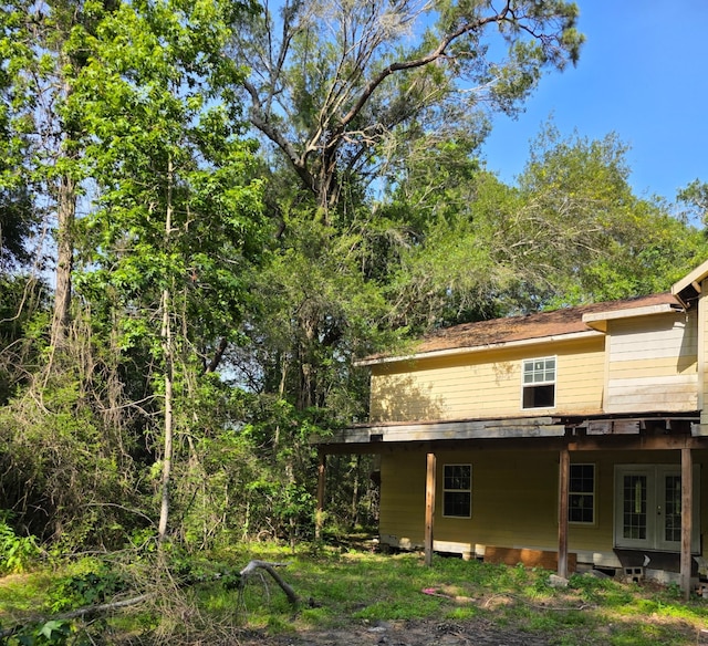 14068 Tower Glen Dr, Conroe, TX 77306 - view of side of property with french doors