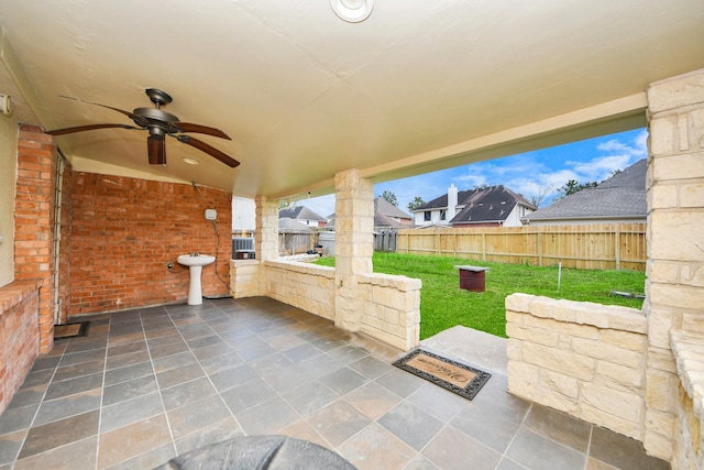 14731 Ravenscroft Way, Houston, TX 77083 - view of patio / terrace featuring ceiling fan