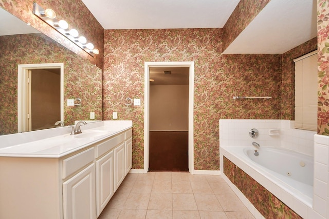 14731 Ravenscroft Way, Houston, TX 77083 - bathroom featuring wallpapered walls, tile patterned flooring, baseboards, a jetted tub, and vanity