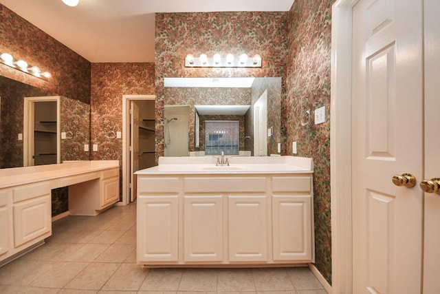 14731 Ravenscroft Way, Houston, TX 77083 - full bathroom featuring wallpapered walls, tile patterned flooring, vanity, and baseboards