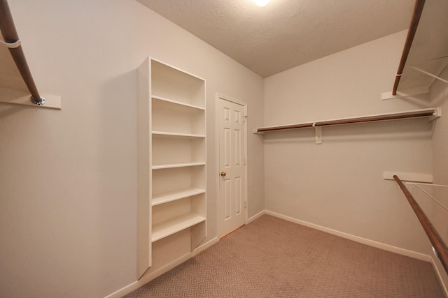 14731 Ravenscroft Way, Houston, TX 77083 - spacious closet featuring carpet