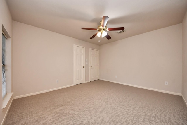 14731 Ravenscroft Way, Houston, TX 77083 - unfurnished bedroom with carpet, baseboards, and a ceiling fan
