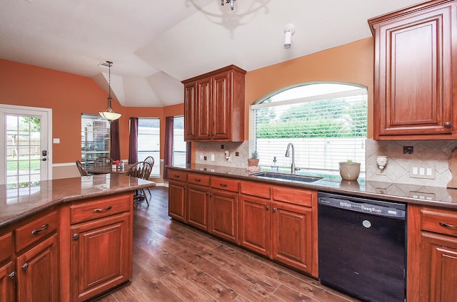 kitchen featuring black dishwasher, a sink, lofted ceiling, dark wood-style flooring, and plenty of natural light