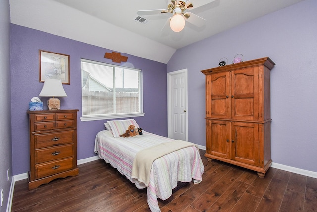 bedroom with dark wood-style flooring, baseboards, lofted ceiling, and ceiling fan