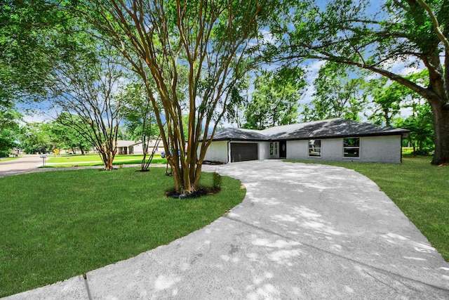 1914 Round Wind Trl, Crosby, TX 77532 - single story home with an attached garage, a front yard, and concrete driveway