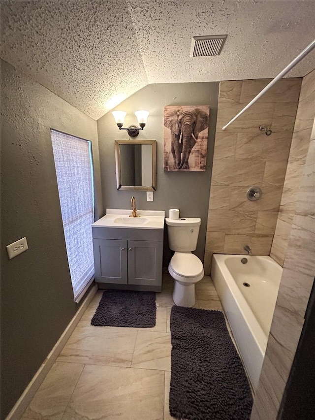 275 Georgia St, Houston, TX 77029 - full bathroom with vanity, vaulted ceiling, toilet, and  shower combination