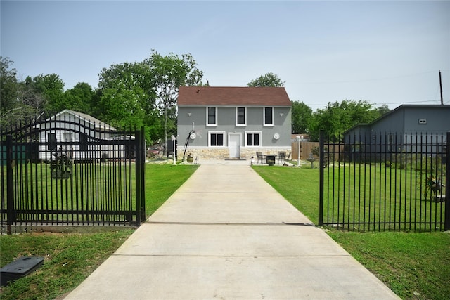 275 Georgia St, Houston, TX 77029 - view of front facade featuring stucco siding, a gate, and stone siding