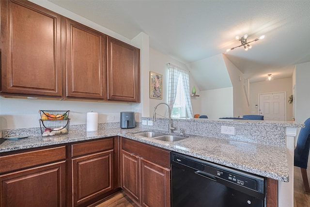 14502 Myrtle Hill Dr, Houston, TX 77069 - kitchen with dishwasher, a sink, a peninsula, wood finished floors, and light stone counters