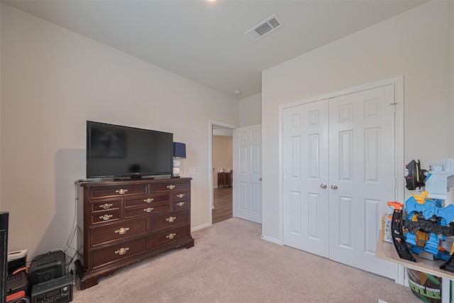 14502 Myrtle Hill Dr, Houston, TX 77069 - bedroom with light carpet, a closet, and baseboards