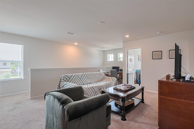 14502 Myrtle Hill Dr, Houston, TX 77069 - living area with light colored carpet, baseboards, and recessed lighting