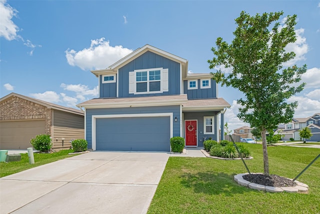 14502 Myrtle Hill Dr, Houston, TX 77069 - view of front of home with board and batten siding, an attached garage, a front yard, and concrete driveway