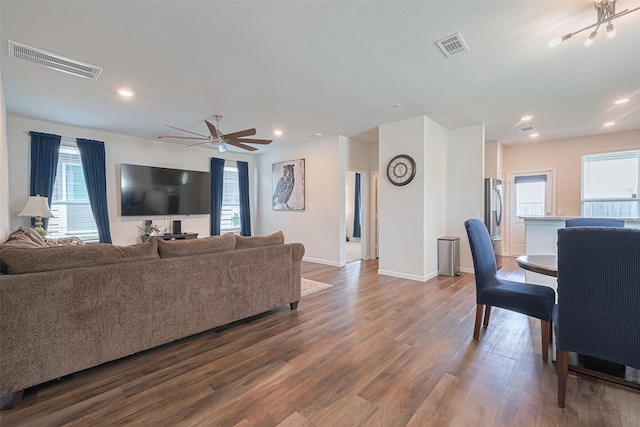 14502 Myrtle Hill Dr, Houston, TX 77069 - living room with wood finished floors, baseboards, recessed lighting, and ceiling fan