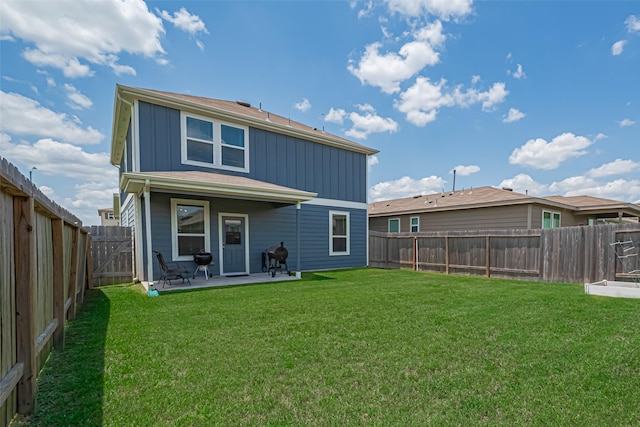 14502 Myrtle Hill Dr, Houston, TX 77069 - back of house featuring board and batten siding, a patio area, and a gate