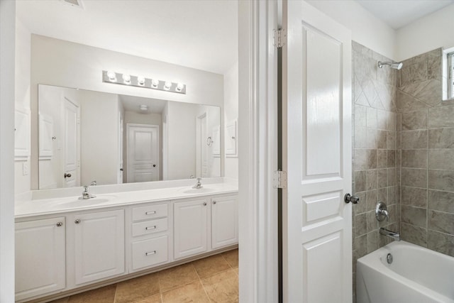 full bathroom with  shower combination, double vanity, and tile patterned floors