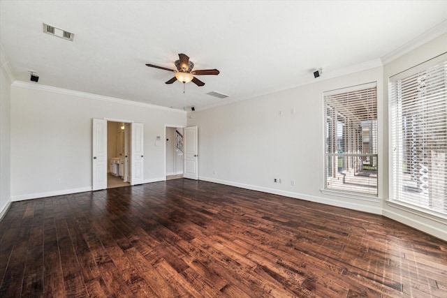 unfurnished room with ornamental molding, hardwood / wood-style floors, a ceiling fan, and baseboards