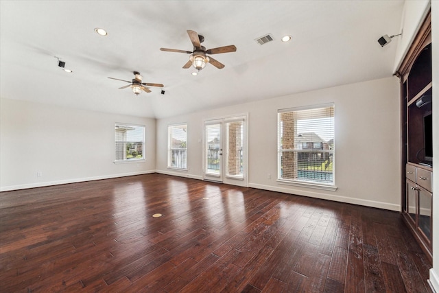 unfurnished living room featuring dark wood-type flooring, ceiling fan, baseboards, lofted ceiling, and recessed lighting