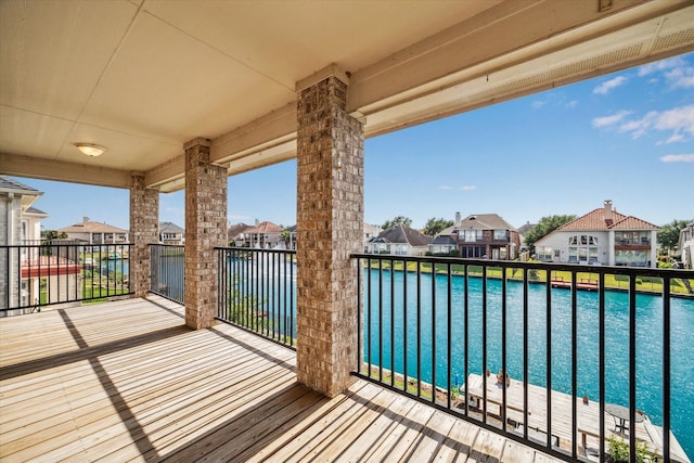balcony featuring a residential view and view of pool